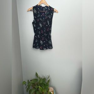 Peplum faux wrap floral shirt